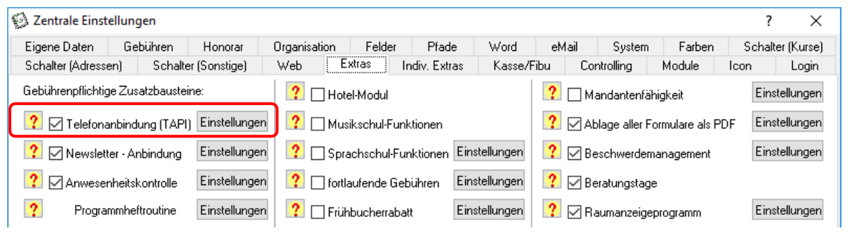 Karteikarte Extras der Zentralen Einstellungen, links oben rot umrahmt der aktivierte Zusatzbaustein Telefonanbindung (TAPI) mit der Schaltfläche Einstellungen, daneben weitere gebührenpflichtige Zusatzbausteine
